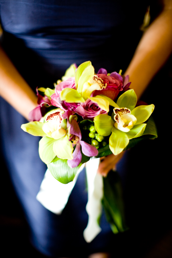 pink and green rose and orchid bouquet - real wedding photo by John and Joseph Photography